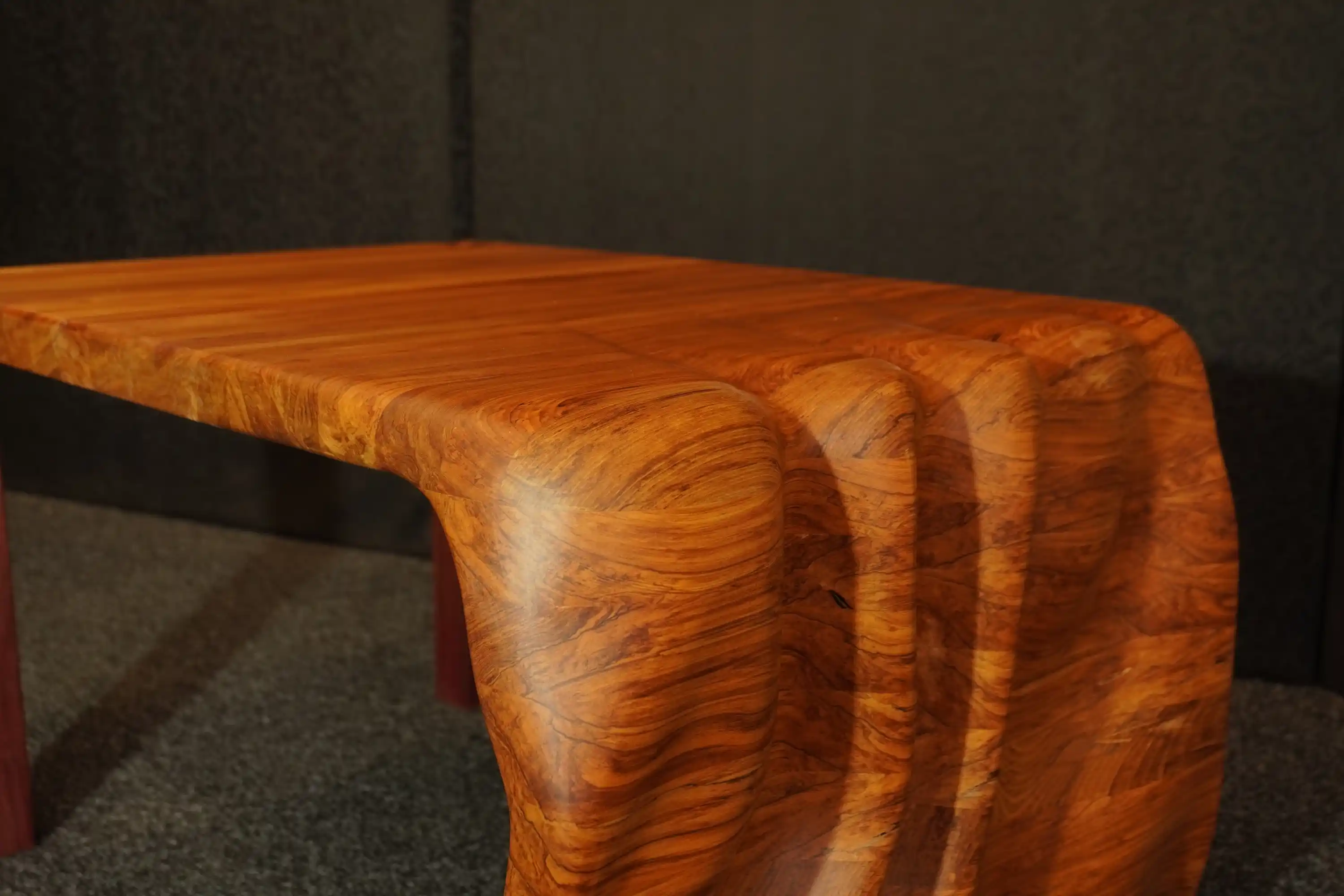 Cascade handcrafted coffee table with waterfall carved design