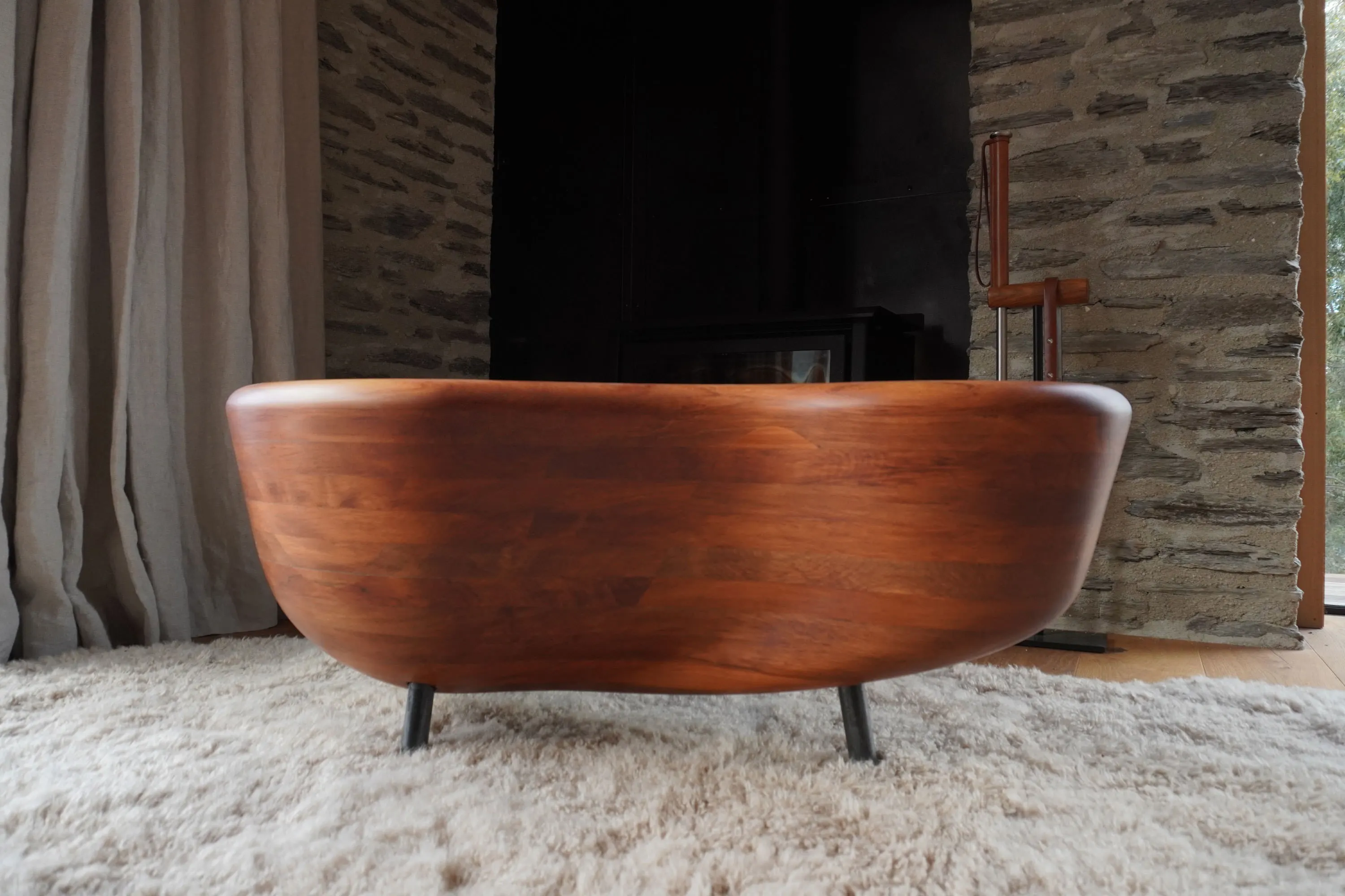 Kidney-shaped handcrafted solid timber Rimu coffee table designed for a living room