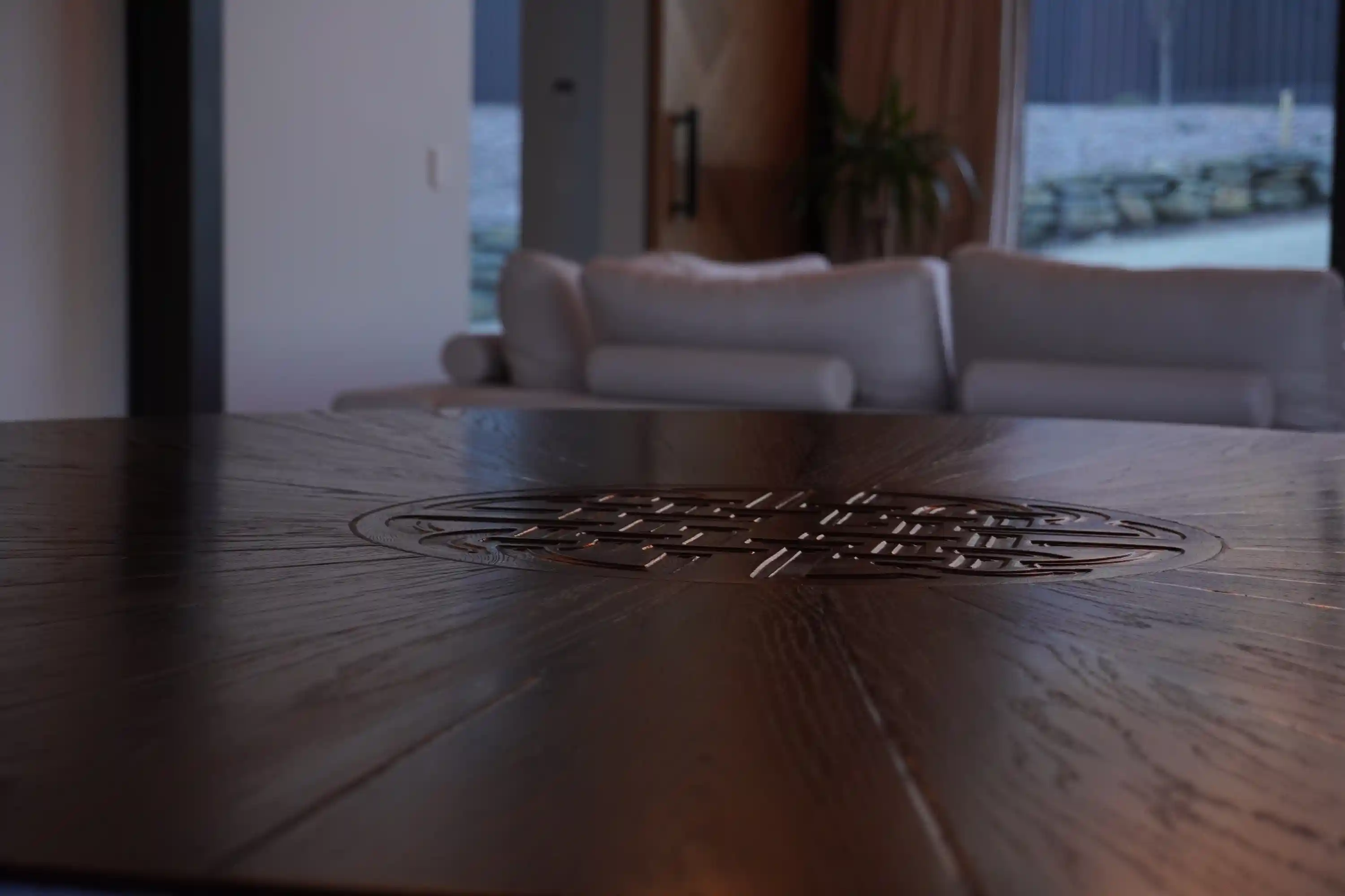 Celtic knot carved into the centre of a handcrafted oak tabletop