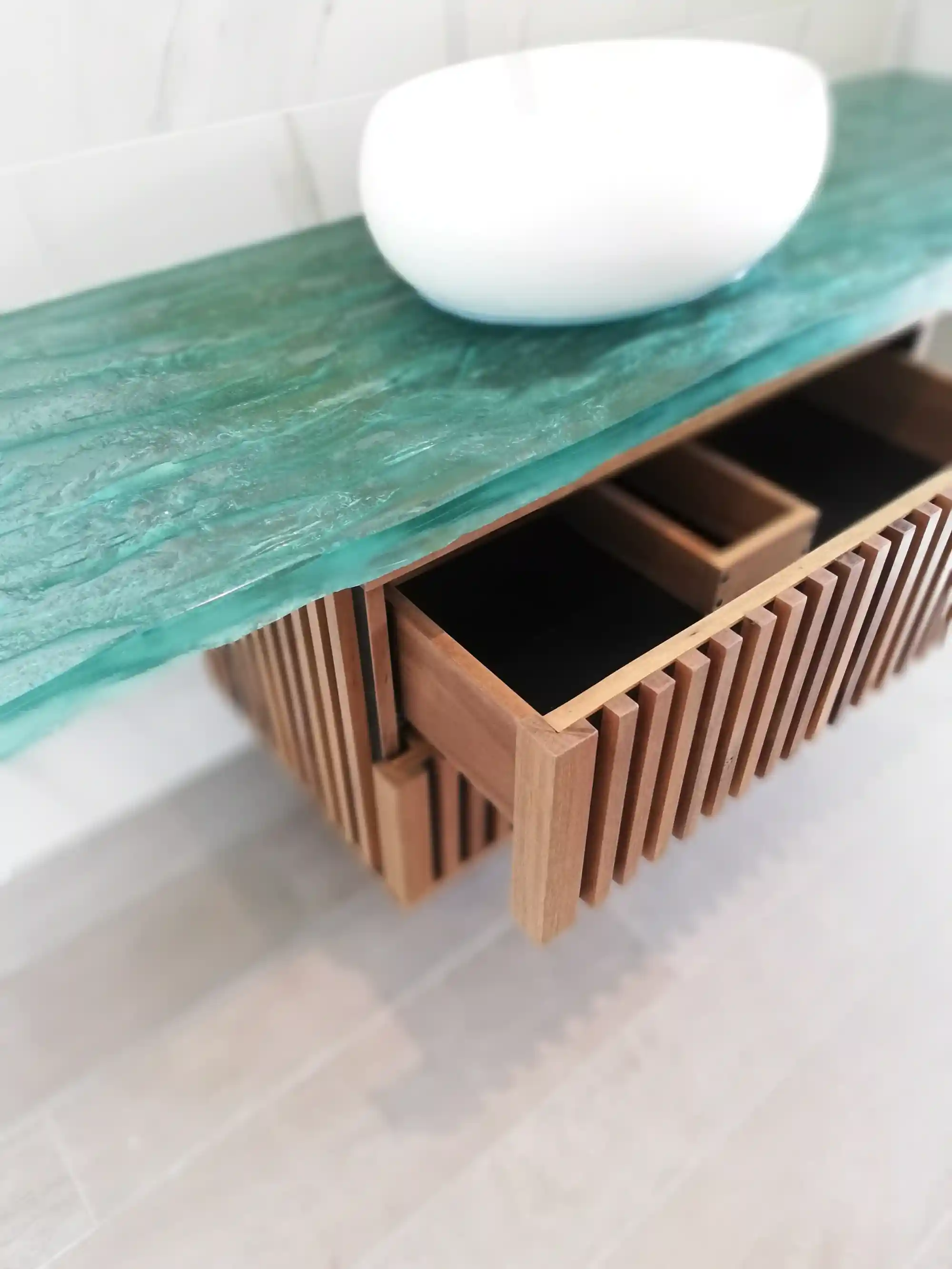 Blue glass vanity top inspired by natural river beds