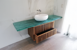 Riverside Greenheart timber vanity with glass river-inspired top
