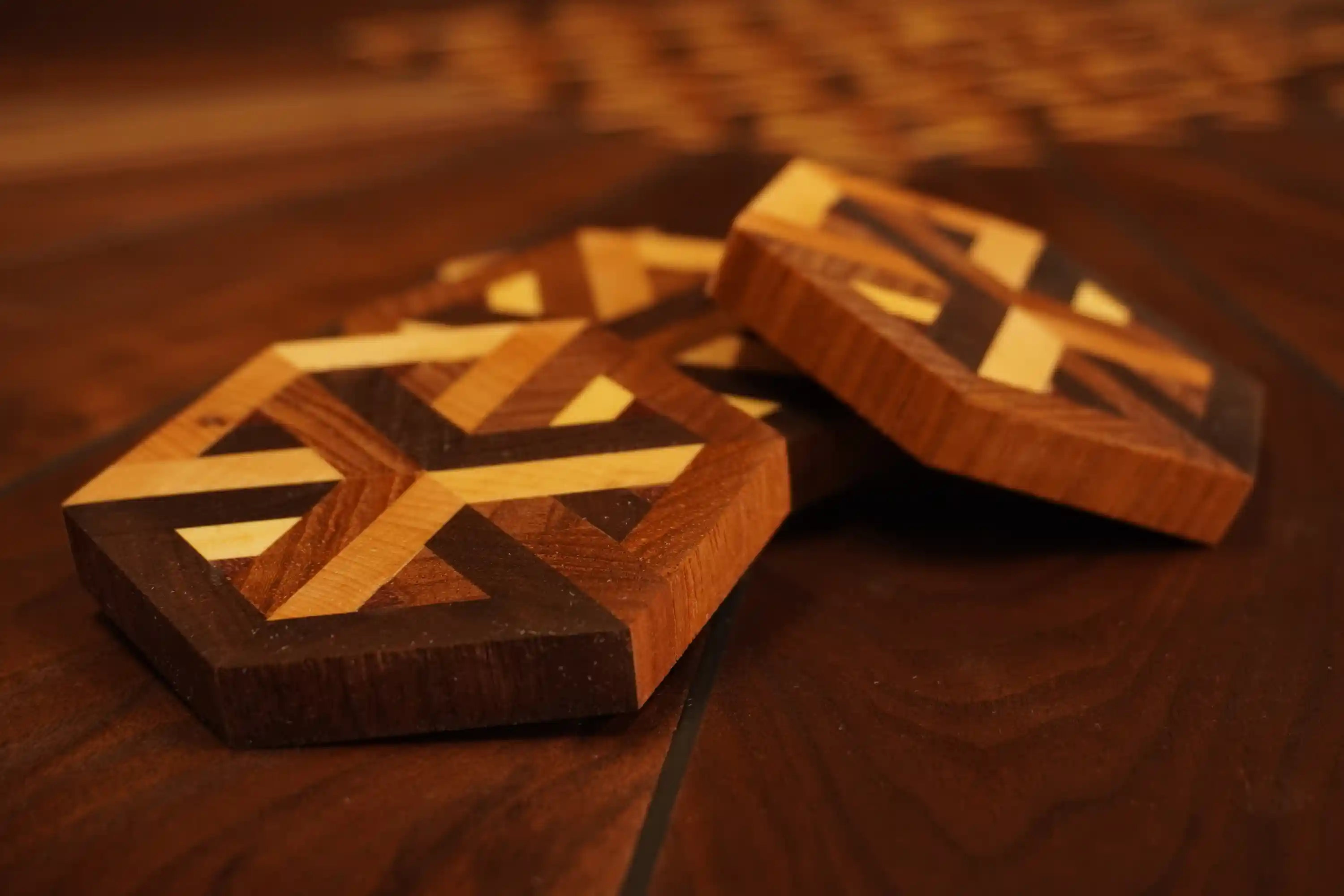 Detailed wood joinery creating the geometric patterns of Walnut Whisper